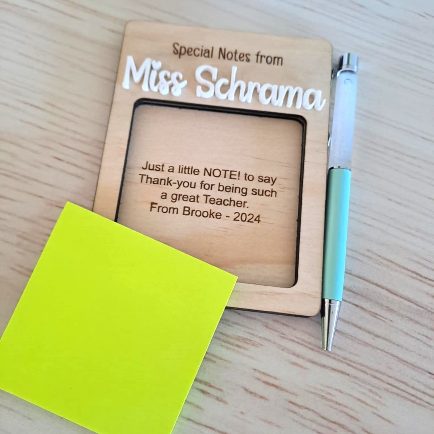 Personalised timber post-it note holder engraved with teacher’s name and thank you message